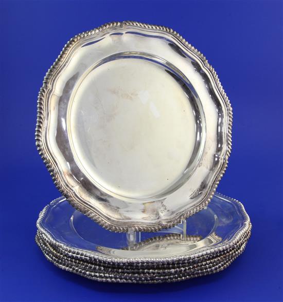 A set of eight early 1970s silver dinner plates by Roberts & Belk, 160.5 oz.